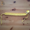 Le bandeau pour cheveux, en coton de couleur jaune. Fait main au crochet.